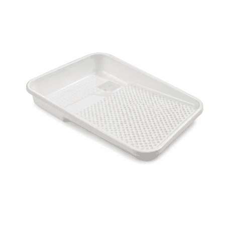 Disposable white paint tray liner on white background