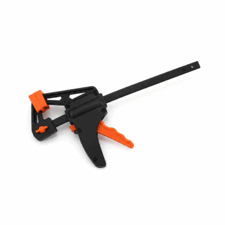 12 inch reversible ratcheting nylon F-clamp with quick release handle on white background